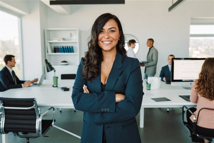A confident woman seen as the leader she already is